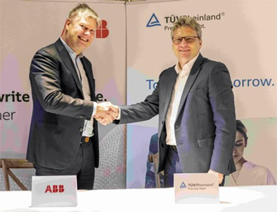 Per-Erik Holsten, Head of Energy Industries, Northern Europe, ABB, and Petr Láhner, Executive Vice President Industrial Services & Cybersecurity at Tüv Rheinland (from left to right)
