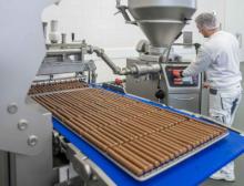 Production of chicken, salmon and insect protein pet food sticks onto racks on 24 lanes with the FS 510 forming system
