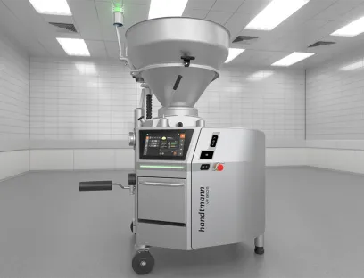 Vacuum filling machine for delicate products or products containing chunks, such as aspic or ham